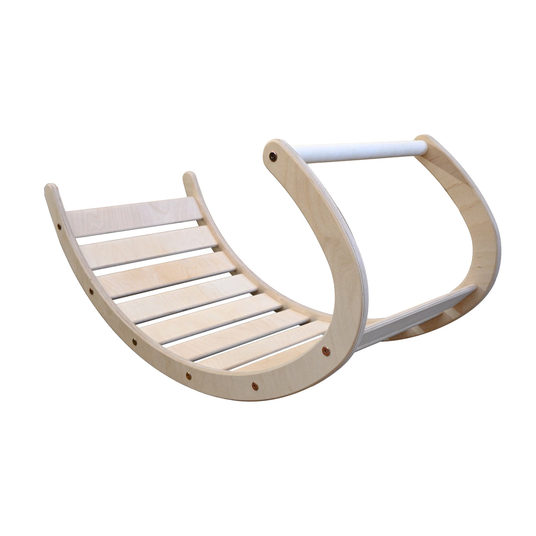 Plywood rocking toy with a curved design.